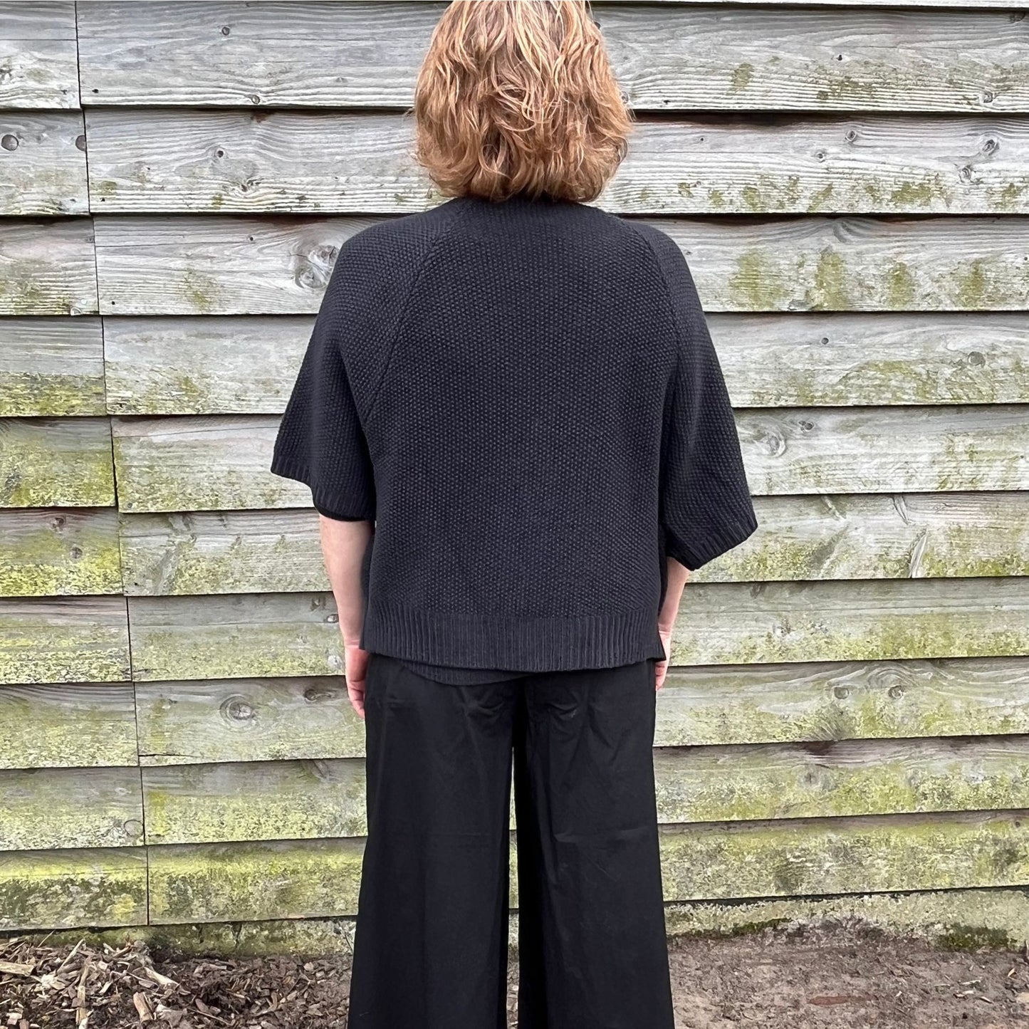 Lydie vest almost black.