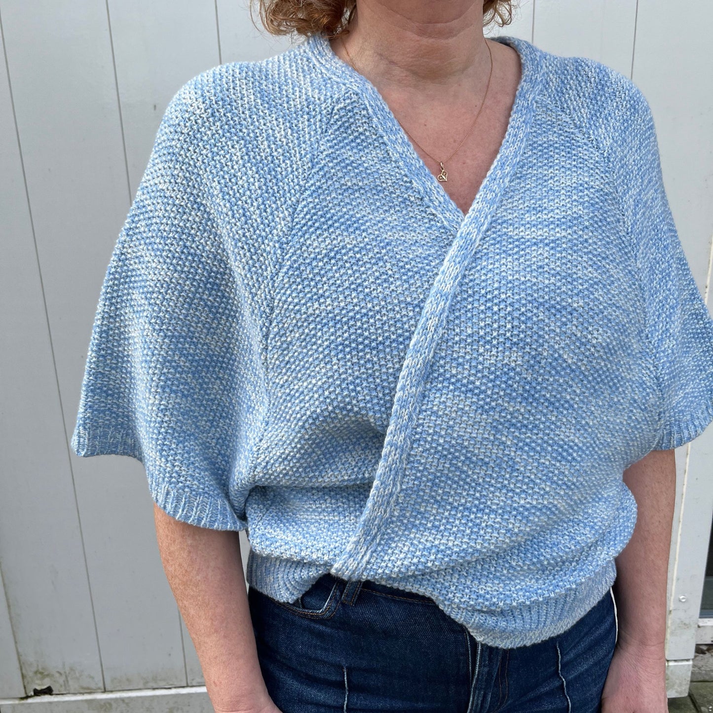 Lydie vest white sky.